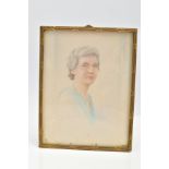 A SMALL PORTRAIT AND BRASS FRAME, a portrait of an elderly lady wearing a double strand of pearls,