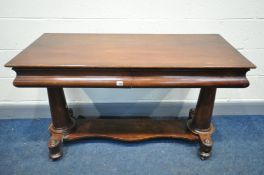 A VICTORIAN WALNUT SIDE TABLE, with two drawers, on twin cylindrical supports, united by a shaped