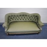 AN EDWARDIAN WALNUT AND GREEN UPHOLSTERED BUTTON BACK CHAISE LONGUE, on ceramic casters, width