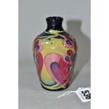 A SMALL MOORCROFT POTTERY VASE, Bleeding Heart pattern, impressed and painted backstamp dated
