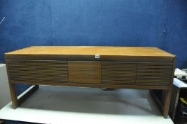 A HMV TYPE 2353 RADIOGRAM in a mid-century cabinet with original warranty card from 1973 (PAT fail