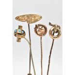 FOUR LATE VICTORIAN YELLOW METAL STICK PINS, to include a cased pin designed with a vine leaf within