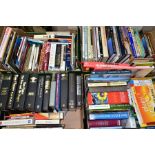 BOOKS, four boxes containing approximately one hundred and fifty titles in hardback and paperback