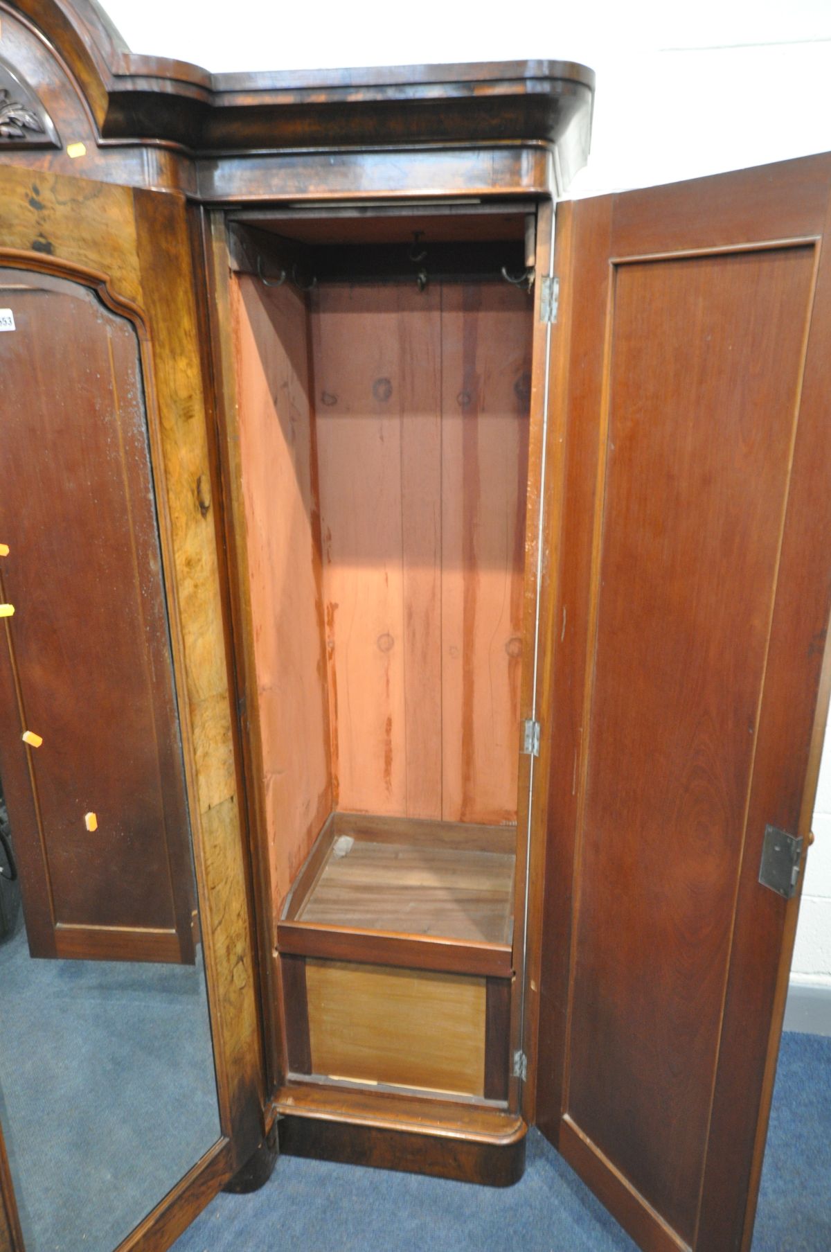 A VICTORIAN WALNUT BREAKFRONT TRIPLE DOOR WARDROBE, with book matched figured walnut veneers to - Image 5 of 5