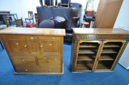 AN OAK SIDE CABINET, with fielded panels, hinged top, and three drawers, width 111cm x depth 33cm