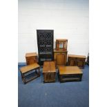 A SELECTION OF OAK FURNITURE, to include a hanging two door cabinet, two hi-fi cabinets, nest of