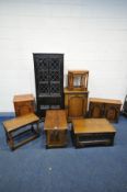 A SELECTION OF OAK FURNITURE, to include a hanging two door cabinet, two hi-fi cabinets, nest of