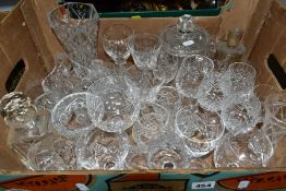 A BOX OF CUT CRYSTAL GLASSWARES AND A BOX OF CUTLERY, over thirty pieces of crystal and other