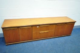 A G PLAN TEAK SIDEBOARD, with two double cupboard doors flanking two drawers, originally base to