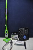 A H20 X5 STEAM MOP with bag of attachments, box of new replacement pads and a Silver Crest steam