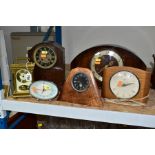 SIX WOODEN AND METAL CASED MANTEL AND ALARM CLOCKS, including a Smiths black dial car clock