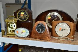 SIX WOODEN AND METAL CASED MANTEL AND ALARM CLOCKS, including a Smiths black dial car clock