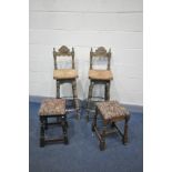A PAIR OF CARVED OAK BAR STOOLS with rush seating and an iron hoop foot rest along with a pair of