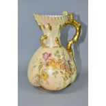 A ROYAL WORCESTER BLUSH IVORY JUG, with fluted rim stylised bark handle and hand painted floral