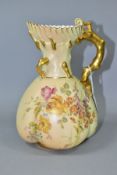 A ROYAL WORCESTER BLUSH IVORY JUG, with fluted rim stylised bark handle and hand painted floral