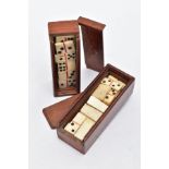 TWO VICTORIAN DOMINO SETS, two sets of miniature bone dominoes in mahogany cases one box measures