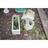 A SMALL COMPOSITE GARDEN WELL ORNAMENT AND A RECTANGULAR PLANTER 62cm long