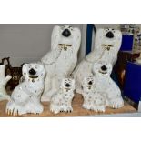 SIX BESWICK OLD ENGLISH DOGS, white and gilt, model nos. 1378-1 (both left facing), 1378-5 and