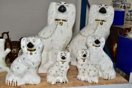 SIX BESWICK OLD ENGLISH DOGS, white and gilt, model nos. 1378-1 (both left facing), 1378-5 and