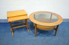 A MID CENTURY TEAK CIRCULAR COFFEE TABLE, with a glass insert, diameter 85cm x height 46cm, and a