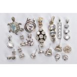 A SELECTION OF CUBIC ZIRCONIA SET JEWELLERY, a selection of white metal earrings and pendants in