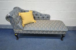 A LATE 20TH CENTURY BLUE AND GOLD FLORAL UPHOLSTERED CHAISE LONGUE, length 137cm