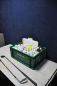 A TRAY CONTAINING A LARGE QUANTITY OF PRE USED GOLFBALLS from makers such as Nike, Callaway, top