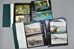 POSTCARDS, approximately 334 postcards in two albums, mostly of Cornwall, particularly Penzance,