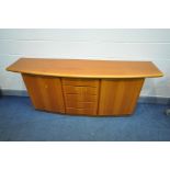 A LATE 20TH CENTURY DANISH TEAK SKOVBY SIDEBOARD, a bank of five drawers flanked by two cupboard