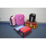 SEVEN VINTAGE AND MODERN SUITCASES including a nesting pair with Tommy Hilfiger badges to front 60cm