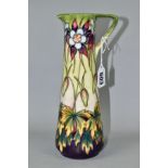 A MODERN MOORCROFT POTTERY AQUILEGIA PATTERN EWER, with tubelined Aquilegia pattern on a green,