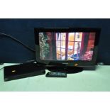 A SAMSUNG LE22B470C9M 22in TV DVD COMBI and a LG DVX-550 DVD player (both PAT pass and working) (2)