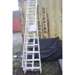 AN ALUMINIUM DOUBLE EXTENSION LADDER 5.89 m long extended and a set of steps