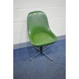 A MID CENTURY SWIVEL CHAIR with green leatherette upholstery and chrome legs