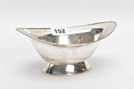 A SILVER BONBON DISH, of a navette form, plain polished design on a raised oval base, hallmarked '