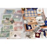 A FITTED WOODEN CASE CONTAINING COINS COMMEMORATIVES AND BANKNOTES, to include a sealed re-struck