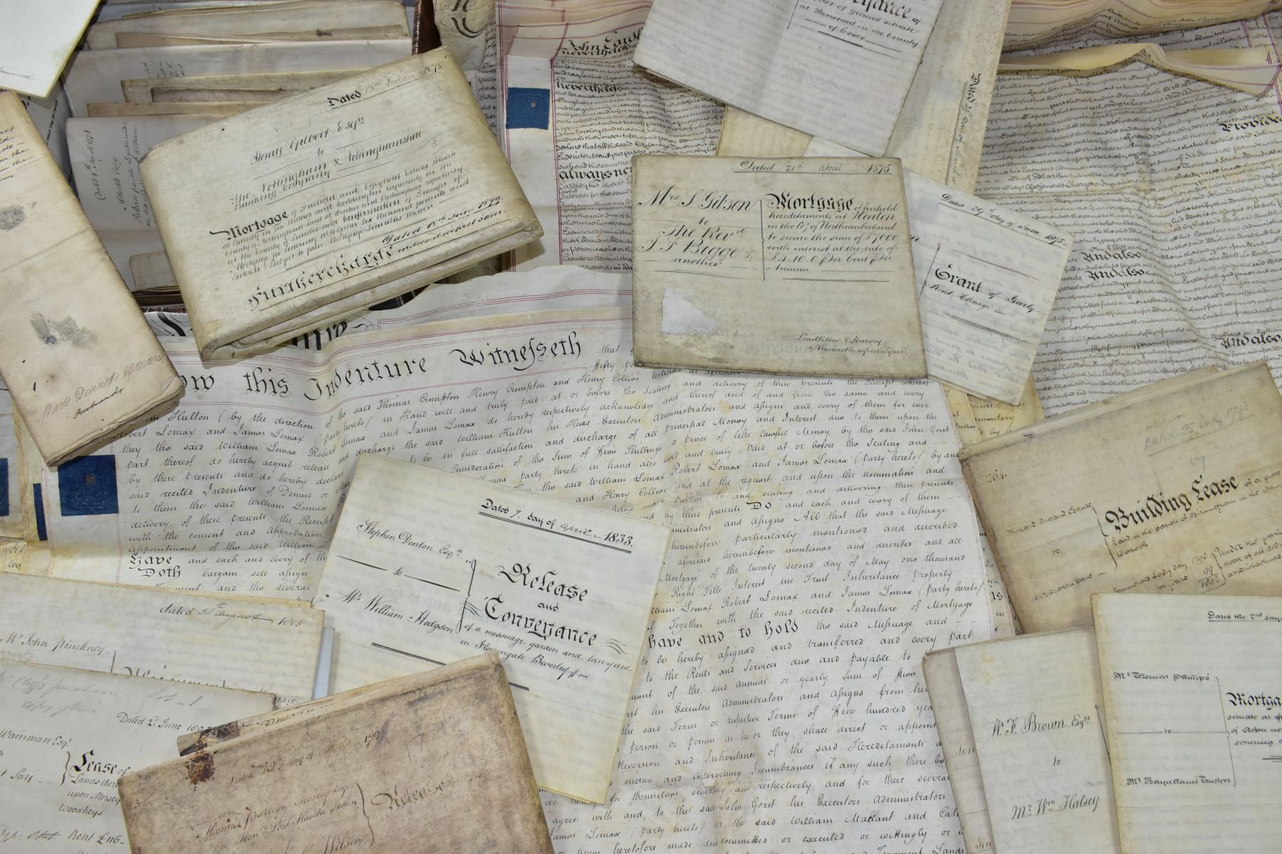 INDENTURES, a collection of approximately sixty-three legal documents dating from 1723 - 1879 and