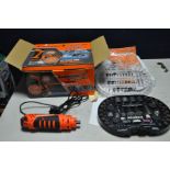A BOXED AND BARELY USED 'THE RENOVATOR' ROTARY TOOL with accessories, DVD and manuals (PAT pass
