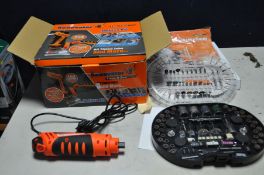 A BOXED AND BARELY USED 'THE RENOVATOR' ROTARY TOOL with accessories, DVD and manuals (PAT pass