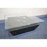 A DFS SPARTA SQUARE COFFEE TABLE, with a glass top and marbleized base, 95cm squared x height 37cm