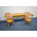 A PINE KITCHEN TABLE width 107cm x depth 61cm x height 77cm and four beech kitchen chairs (5)