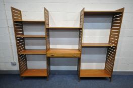 A THREE BAY LADDERAX MODULAR SHELVING SYSTEM with four shelves and a single drawer unit (with key)