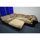 A LARGE BROWN LEATHER AND UPHOLSTERED MODULER CORNER SOFA, in five sections, length 322cm x depth
