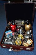 A BROWN LEATHER COVERED SUITCASE CONTAINING TWO SODA SYPHONS, SILVER PLATE AND PEWTER, ETC,