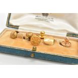 SIX EARLY 20TH CENTURY DRESS STUDS, to include one 15ct gold pair with engraved floral and scrolling