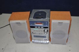 A SONY CMT-EP313 MICRO HI FI with a pair of speakers (PAT pass and working)