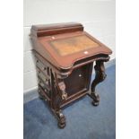 A REPRODUCTION VICTORIAN STYLE MAHOGANY DAVENPORT, with a brown leather skiver inlay, and four