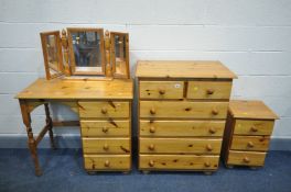 A PINE BEDROOM SUITE, comprising a dressing table, width 90cm x depth 47cm x height 82cm with a