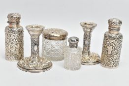 A PAIR OF SILVER DWARF CANDLESTICKS AND VANITY ITEMS, the candlesticks decorated with a scroll and