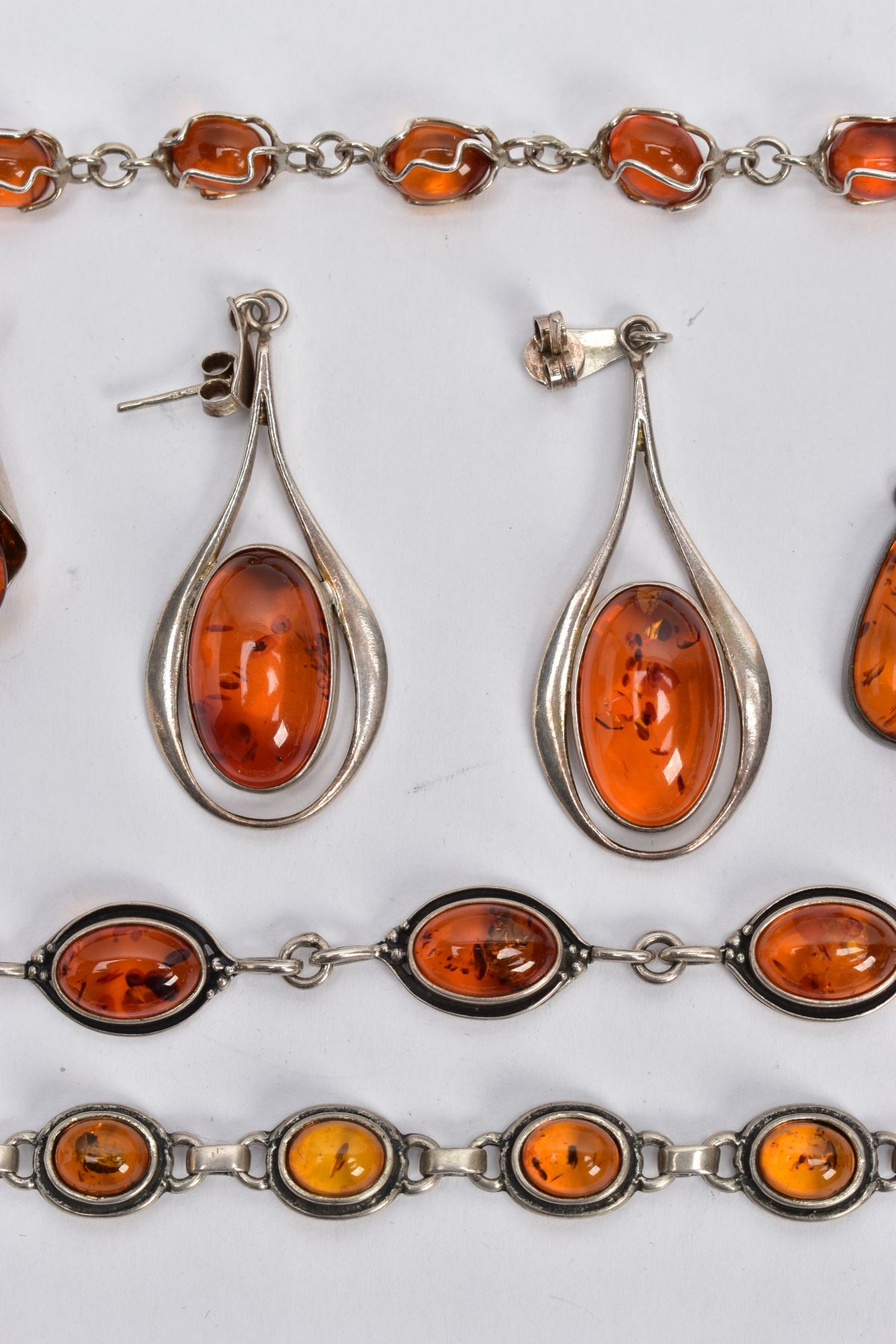 A SELECTION OF AMBER SET JEWELLERY, to include two white metal bracelets set with amber cabochons, - Image 2 of 6